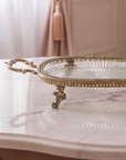Close-up of the Athena Tray's fluted glass base catching the light.