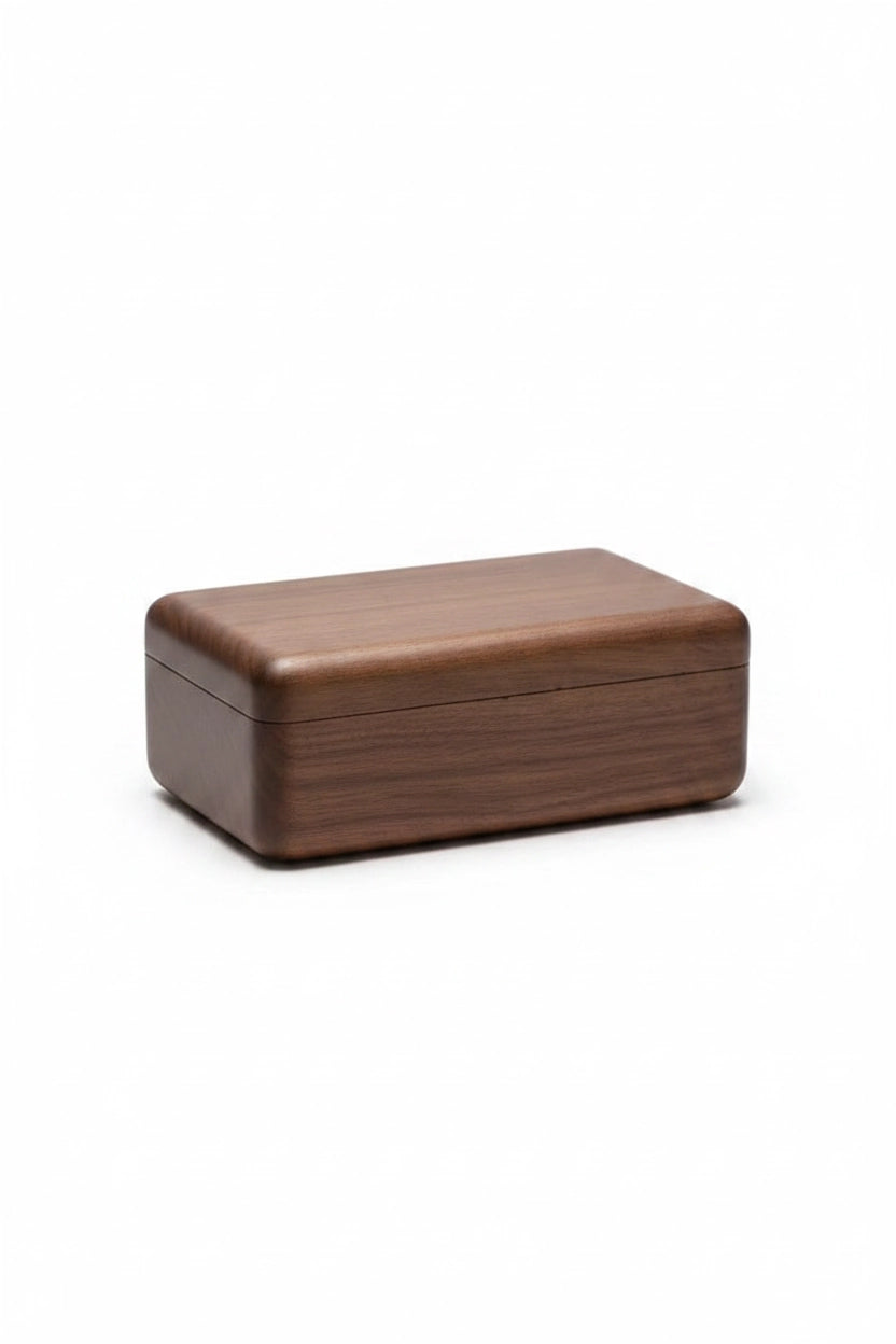 A rectangular wooden keepsake box with rounded corners and a visible wood grain pattern, shown on a plain white background.